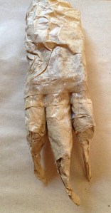 strapping together to make a hand