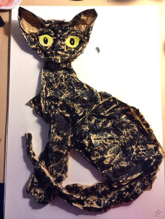 I added the eyes. I wanted them to contrast with the rest in their bold blockiness, not crumpled at all. The Cornish has huge glossy eyes.